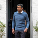 Rishi Sunak leaves his London home